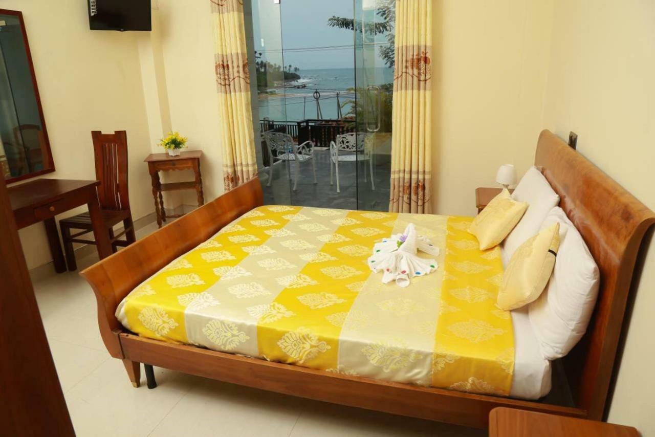 טנגלה Queens Beach Hotel מראה חיצוני תמונה